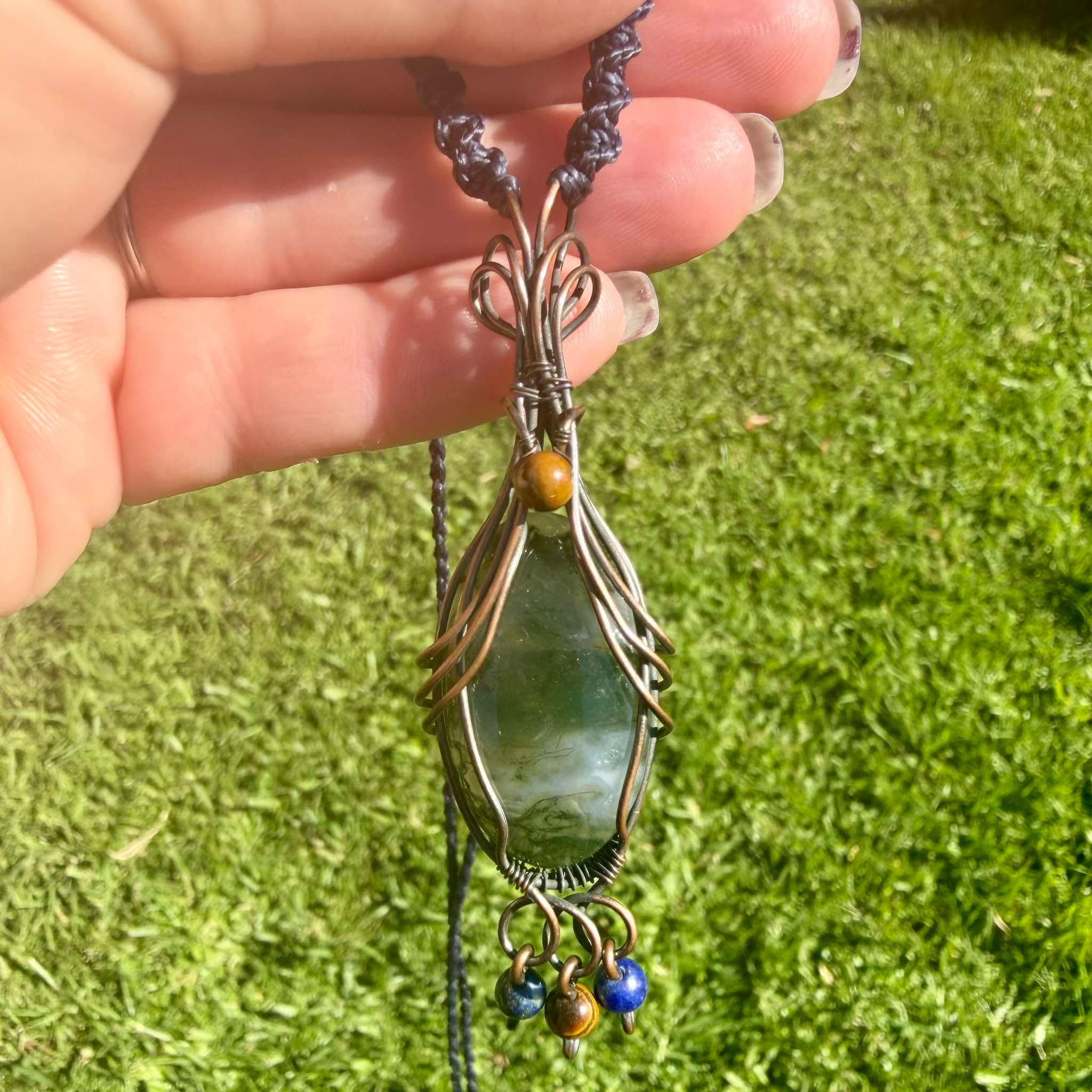 Moon Grove is a handmade moss agate, tiger's eye and lapis lazuli necklace from New Zealand, a Luna Magick collab piece for grounding, truth and abundance.