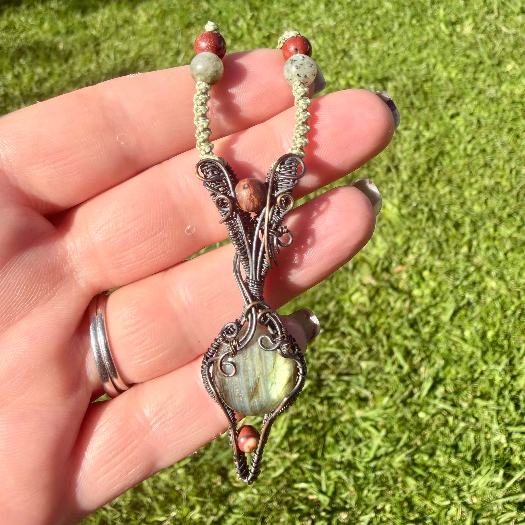 Aurora Magick is a handmade labradorite and mookaite necklace from New Zealand, a Luna Magick collab for transformation and intuition.