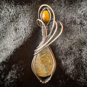 handmade wire wrapped golden rutile quartz pendant made in New Zealand