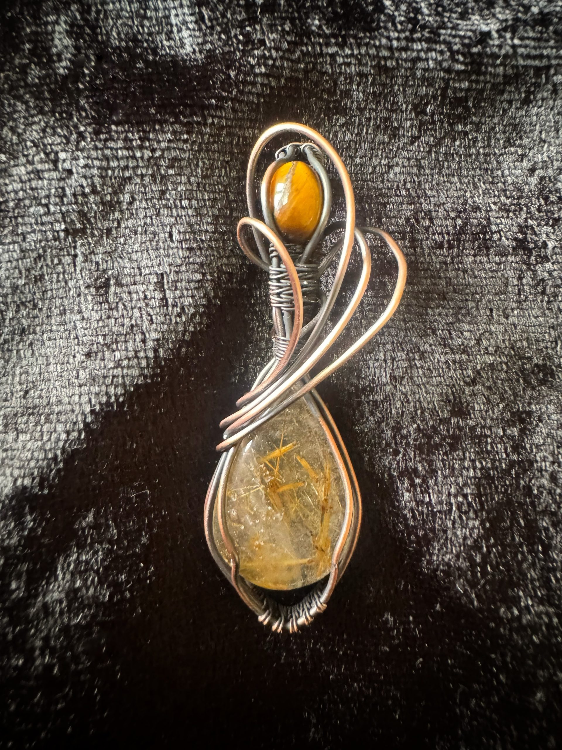 handmade wire wrapped golden rutile quartz pendant made in New Zealand
